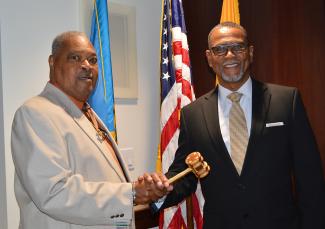 Lathem Congratulates Ransome with Meeting Gavel Transfer